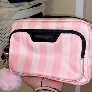 A purse of makeup from victoria secret